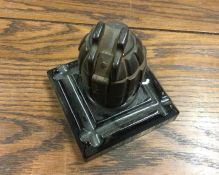 A World War I grenade desk ornament entitled, 'S B