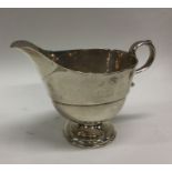 An 18th Century crested silver sauceboat. Possibly