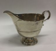 An 18th Century crested silver sauceboat. Possibly