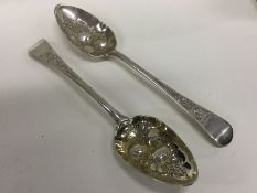 A pair of heavy George III silver berry spoons. Lo