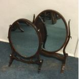 Two Antique mahogany toilet mirrors. Est. £25 - £3