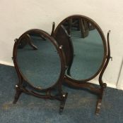 Two Antique mahogany toilet mirrors. Est. £25 - £3