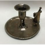 An 18th Century silver chamberstick with an Old Sh