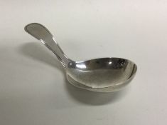 A Georgian silver caddy spoon of shaped form. Lond