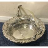A fine George II pierced silver basket, the border cast