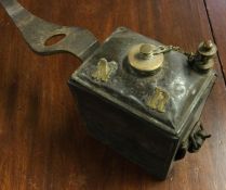 An oil bottle for a machine gun in leather case ma