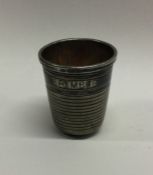 A silver plated thimble cup. Est. £50 - £80.