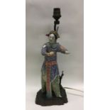An unusual Chinese porcelain figure mounted as a l