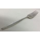GEORG JENSEN: A silver fork of typical design. App