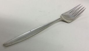 GEORG JENSEN: A silver fork of typical design. App