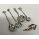 A modern silver caddy spoon together with a pin cu