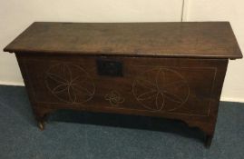 An Antique oak plank top coffer. Est. £80 - £120.