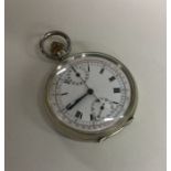 A gent's silver engine turned stopwatch with white