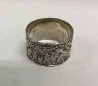 A good Chinese silver napkin ring decorated with f