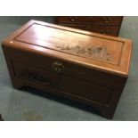 A small Camphor wood trunk. Est. £20 - £30.