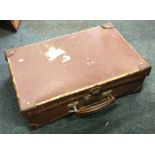 A World War II child's suitcase. Est. £10 - £20.