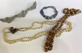 A silver gilt mounted necklace etc. Est. £20 - £30