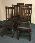 A set of six oak dining chairs. Est. £30 - £40.