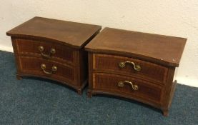 A pair of inlaid two drawer chests. Est. £20 - £30