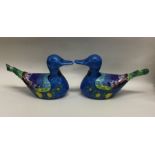 A pair of silver and enamel sauce boats in the for