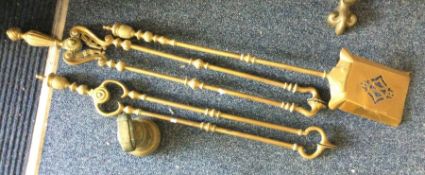 A brass companion set together with a weight. Est.