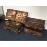 Four Vintage suitcases. Est. £30 - £50.