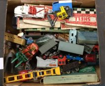 A box of assorted die-cast Dinky and Corgi toy car