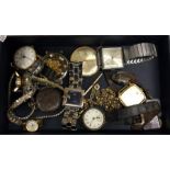 A box containing various wrist, pocket and fob wat