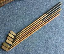 A brass mounted HICKORY golf putter by Abbey toget