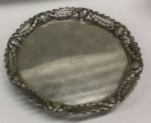 An early 18th Century cast silver tray with pierce
