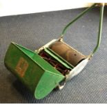 An old push mower. Est. £20 - £30.