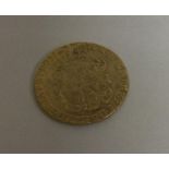 A George III guinea dated 1776. Approx. 8.4 grams. Est.