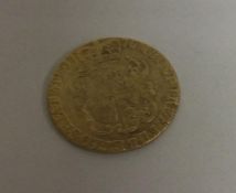 A George III guinea dated 1776. Approx. 8.4 grams. Est.