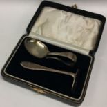 A cased silver pusher. Approx. 38 grams.