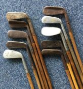 A wooden handled HICKORY golf club by H Ball toget