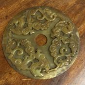 A large Chinese circular hardstone disc. Est. £30