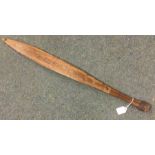 An unusual Australian Woomera spear thrower. Est.