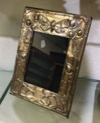 A stylish silver Arts & Crafts picture frame. Est.