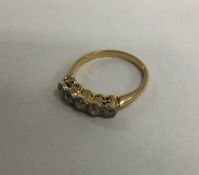 A good diamond five stone old cut ring in 18 carat