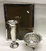 A silver picture frame together with a sugar bowl