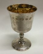 A silver goblet with gilt interior. London 1977. B