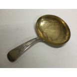 A silver caddy spoon with gilt bowl. Birmingham 17