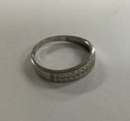 A 9 carat two row ring. Approx. 1.5 grams. Est. £2