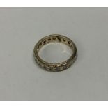 A 9 carat full eternity ring. Approx. 2.7 grams. E