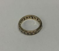 A 9 carat full eternity ring. Approx. 2.7 grams. E
