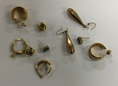 A group of gold mounted and other earrings. Approx