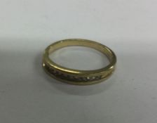 A small 9 carat diamond half eternity ring. Approx