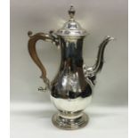 A fine quality George III silver coffee pot with c