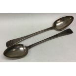 A pair of Georgian silver basting spoons. Approx.