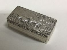 A George III silver snuff box chased with dog hunt